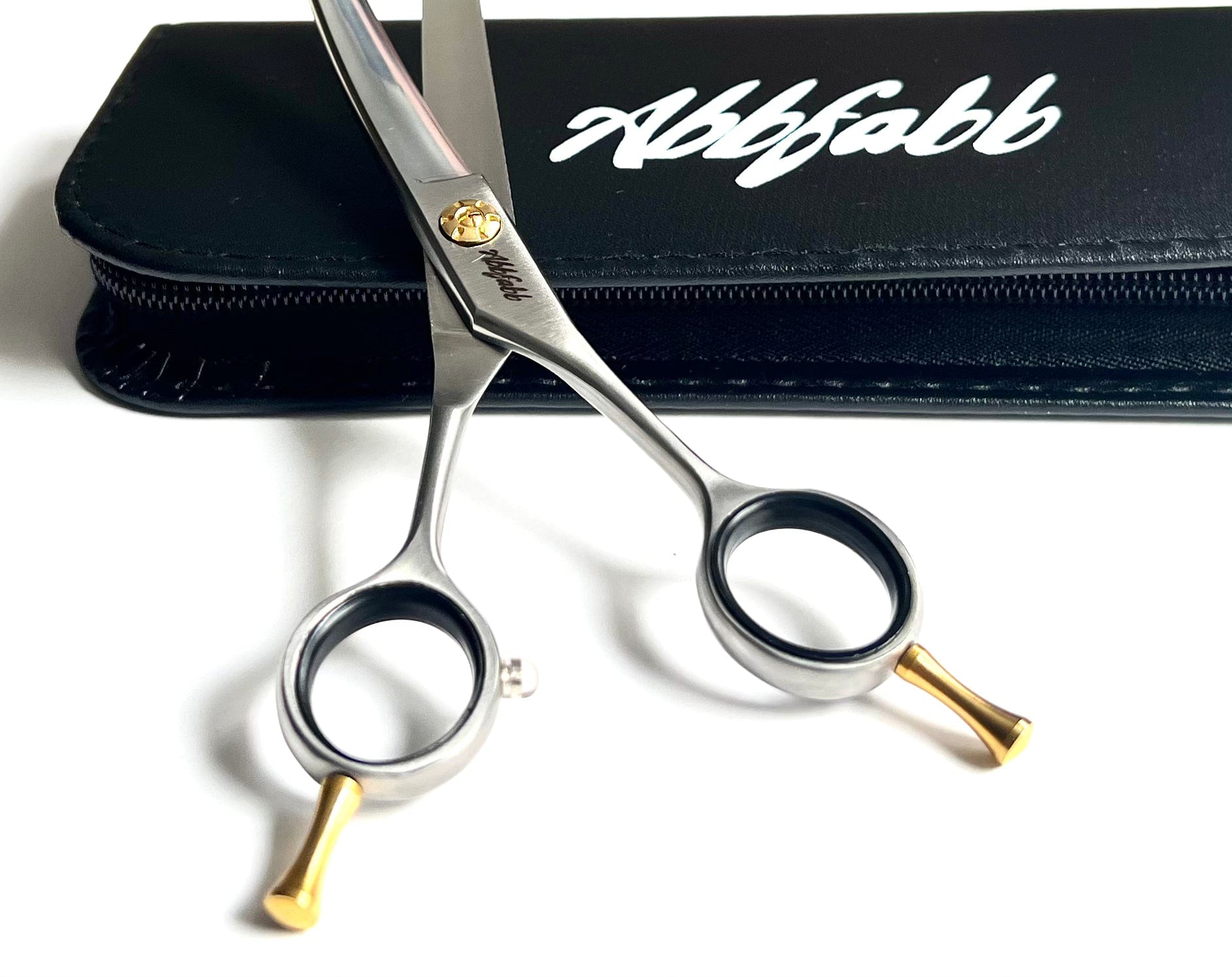 Abbfabb Grooming Scissors Ltd 7" Micro Serrated Reversible Curved Dog Grooming Scissor. 7" Flippable micro serrated Asian Fusion Curved Scissor. Muzzle Maker